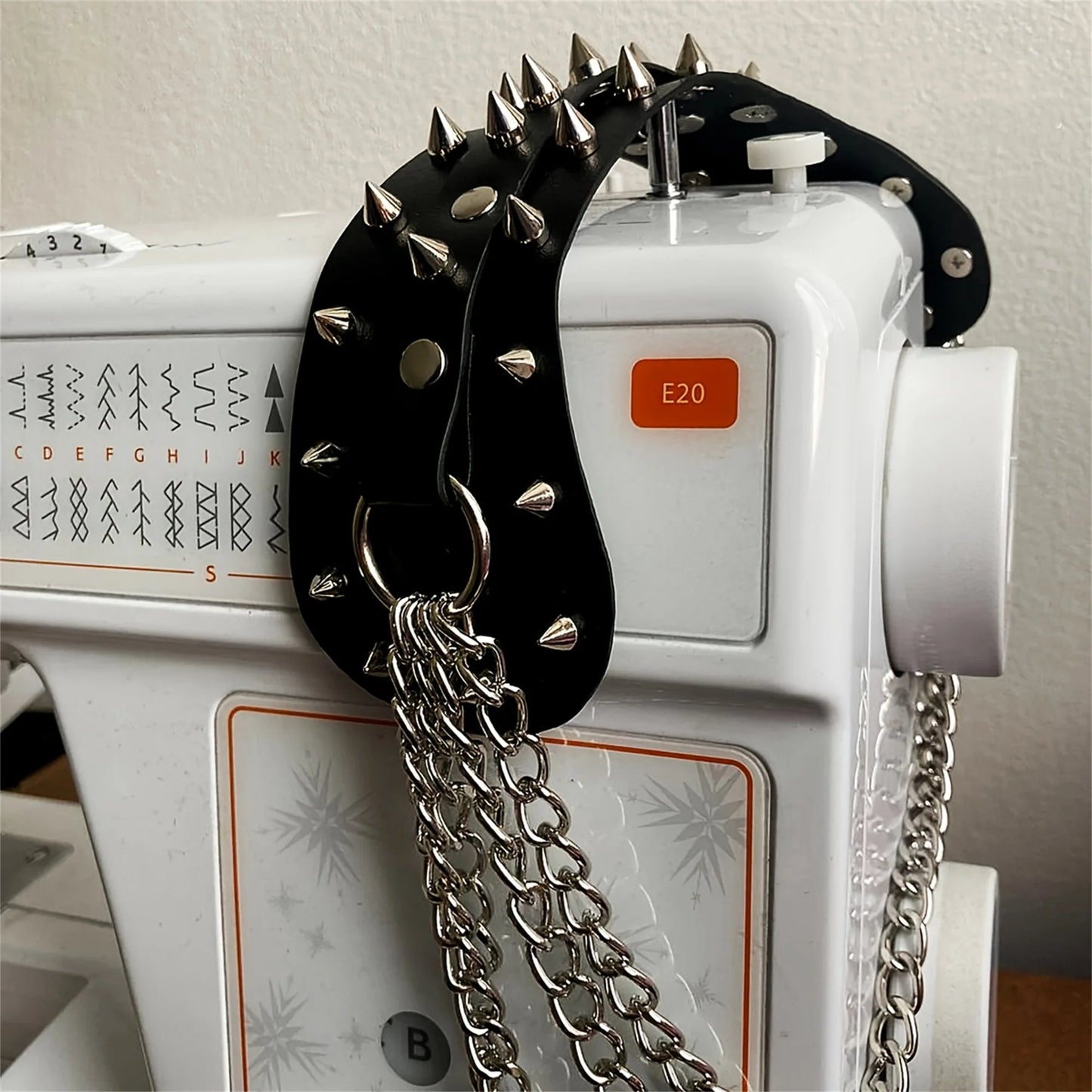 UYEE unisex synthetic leather shoulder armor with rivet details and chain tassel fashionable black studded waistband accessory Viralgem Store