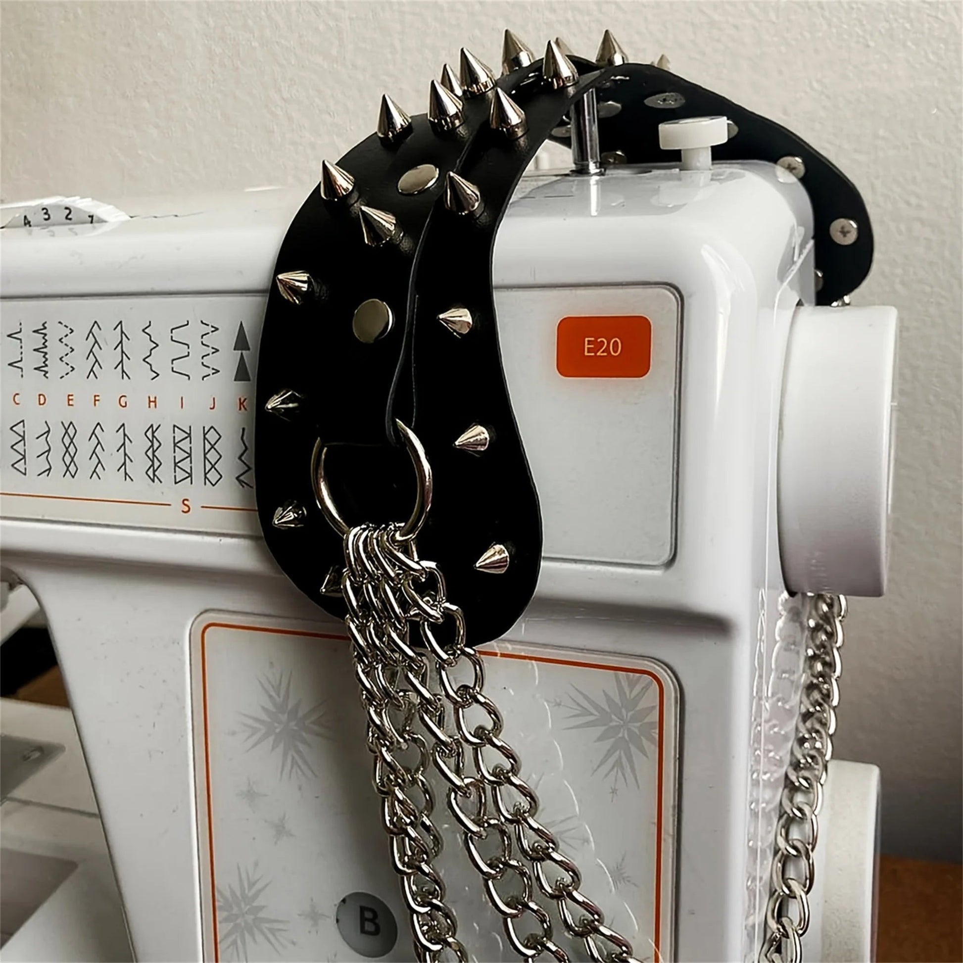 UYEE unisex synthetic leather shoulder armor with rivet details and chain tassel fashionable black studded waistband accessory Viralgem Store